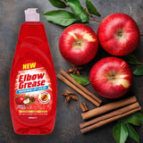 Elbow Grease washing up liquid in a red bottle with apple and cinnamon scent, surrounded by apples and cinnamon sticks