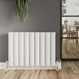 White radiator painted with radiator enamel white paint, enhancing a modern home interior