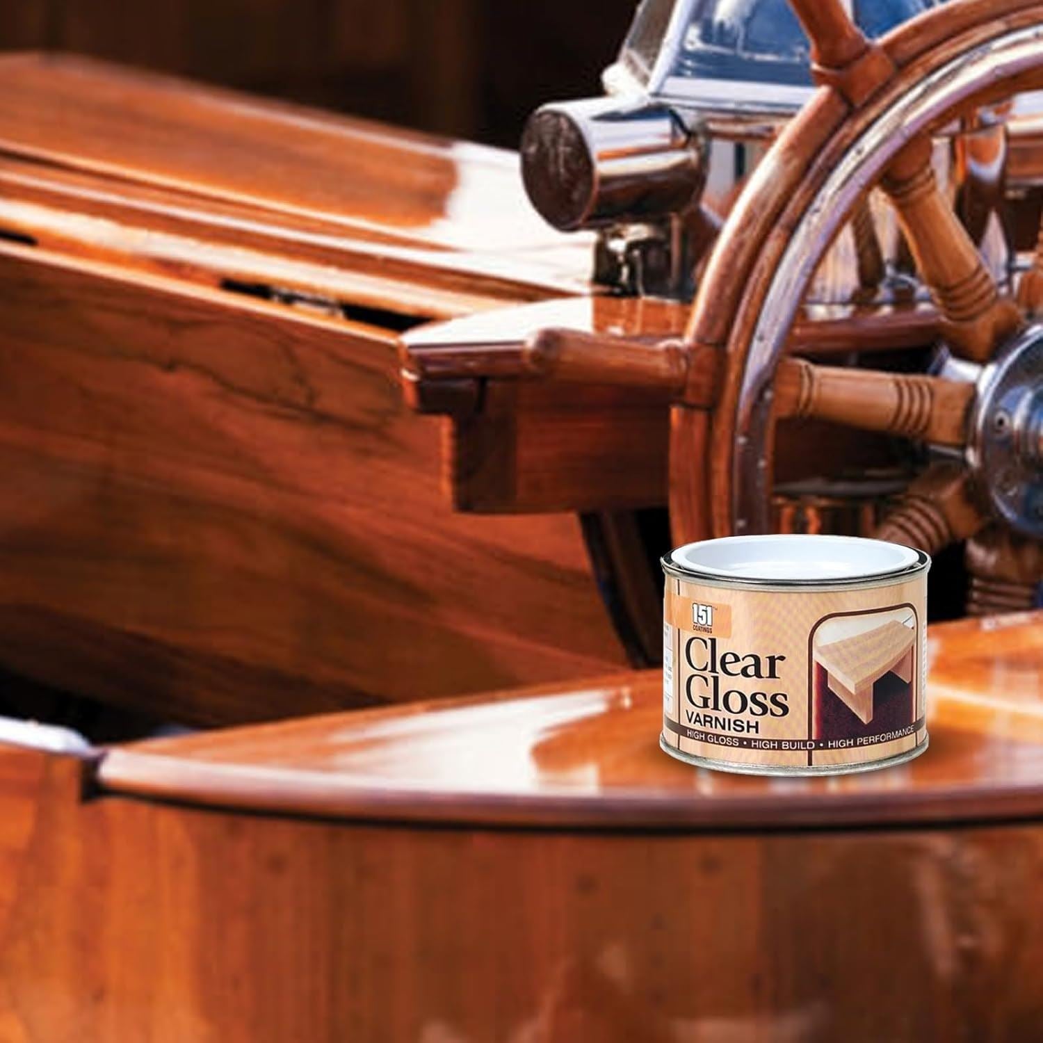 Tin of 151 clear gloss varnish paint on a wooden boat steering wheel
