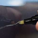 Car scratch remover pen applied to a vehicle scratch for easy repair and restoration