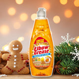 Elbow Grease gingerbread washing up liquid in a festive setting with gingerbread cookies and holiday decor
