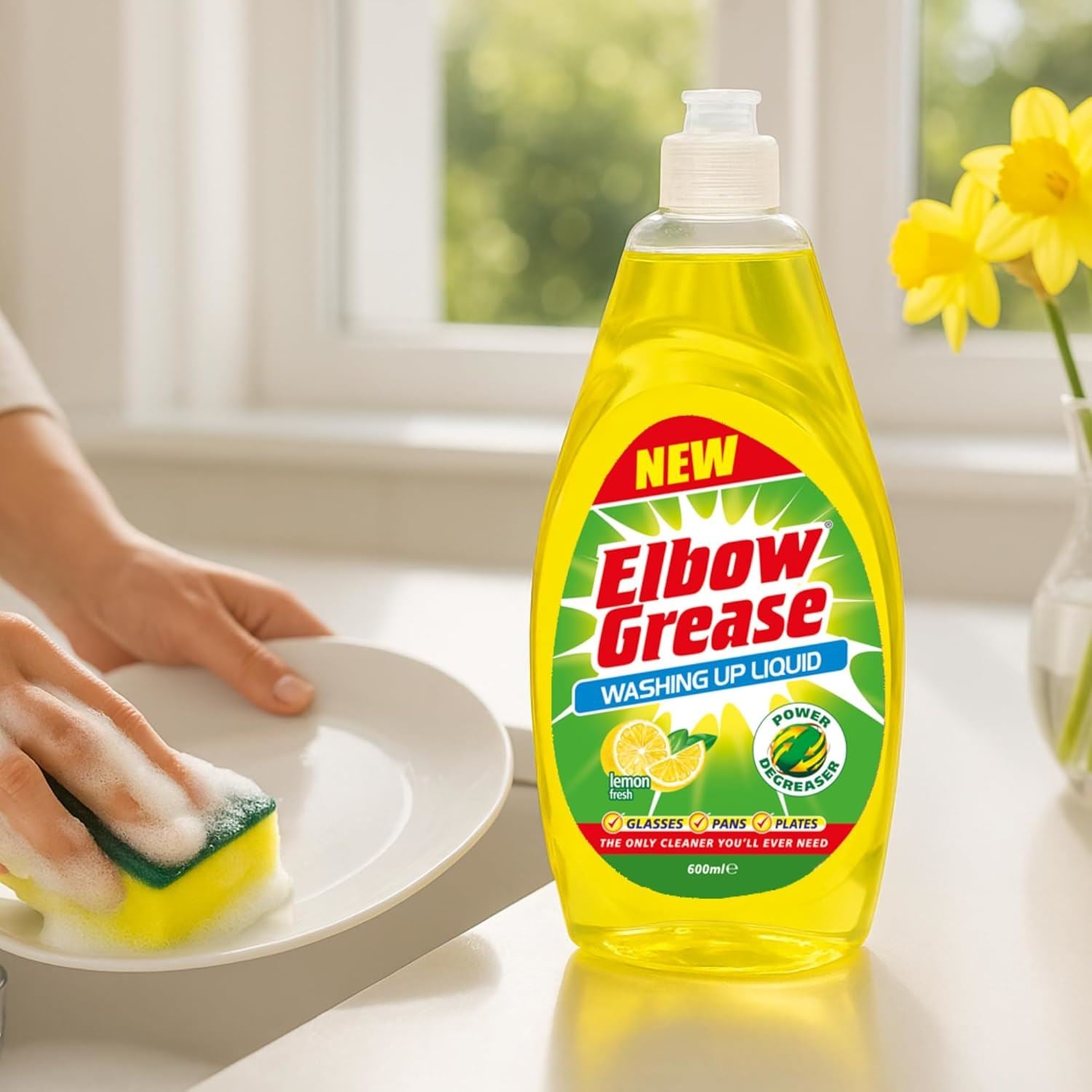 Elbow Grease washing up liquid lemon in a yellow bottle with a person washing a dish