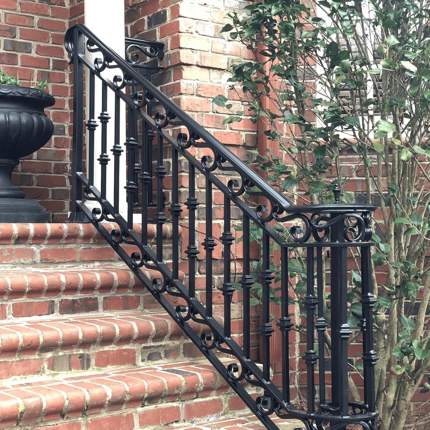 Elegant wrought iron railing painted with iron gate black gloss paint for a stylish entryway