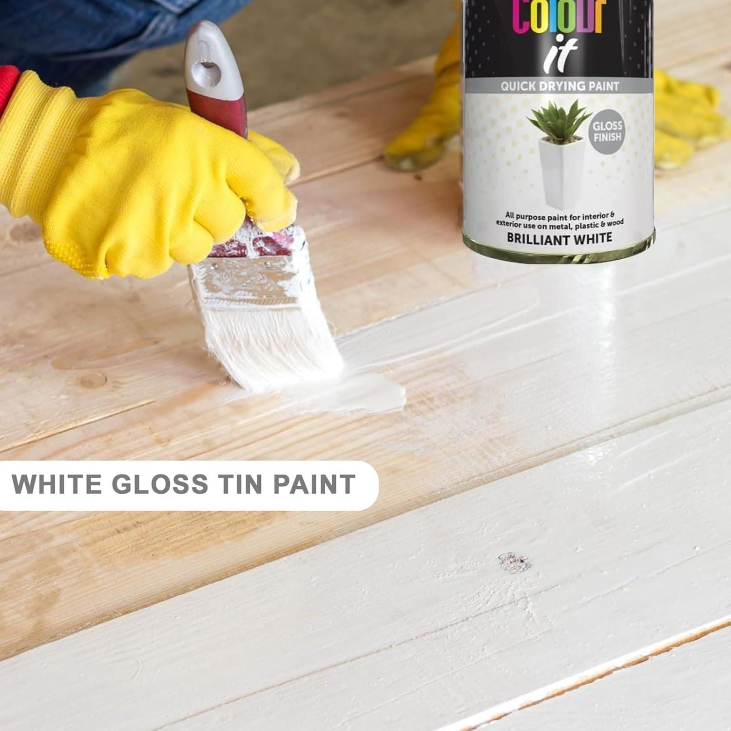 Colour If Brilliant White Gloss Paint Tin with a brush being used on a wooden surface