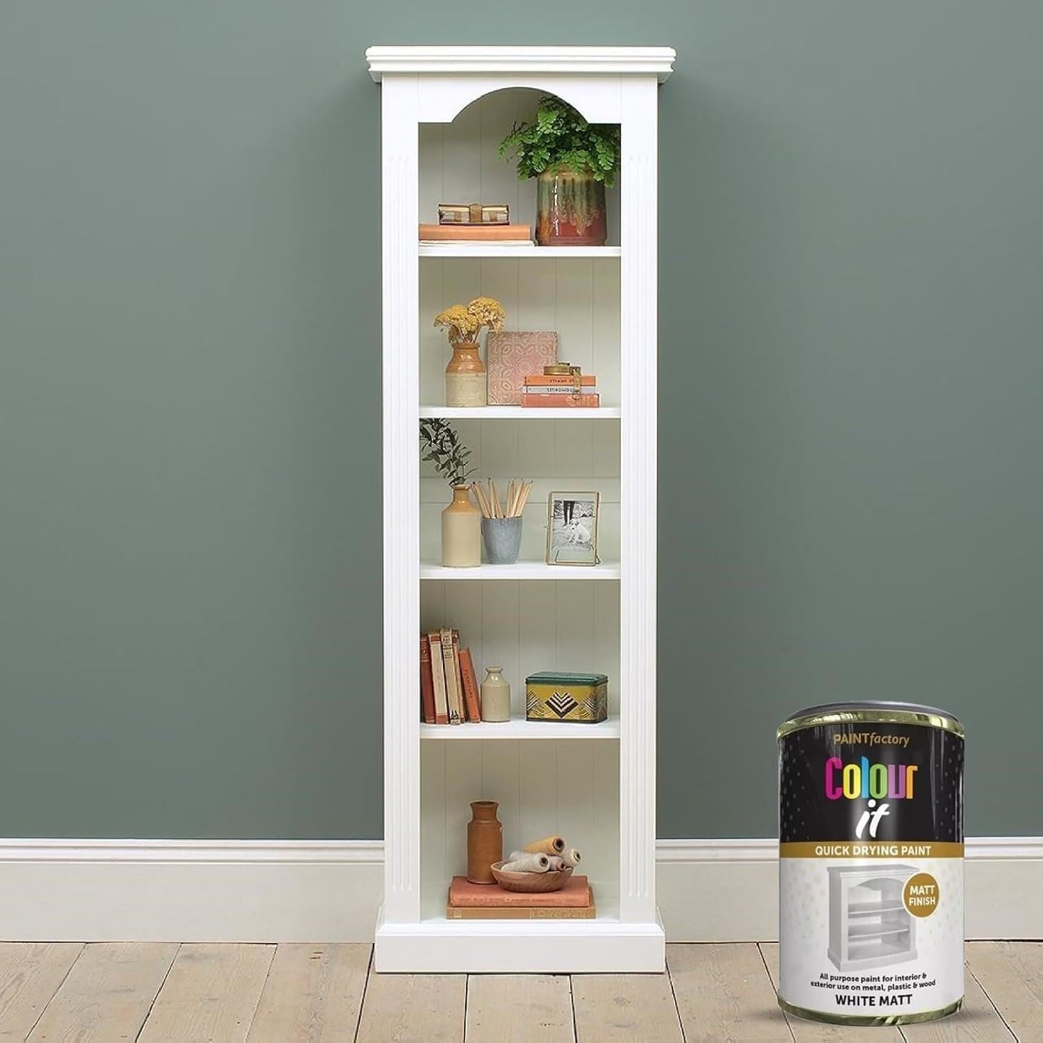 300ml tin of white matt tin paint by Paint Factory next to a stylish bookshelf display