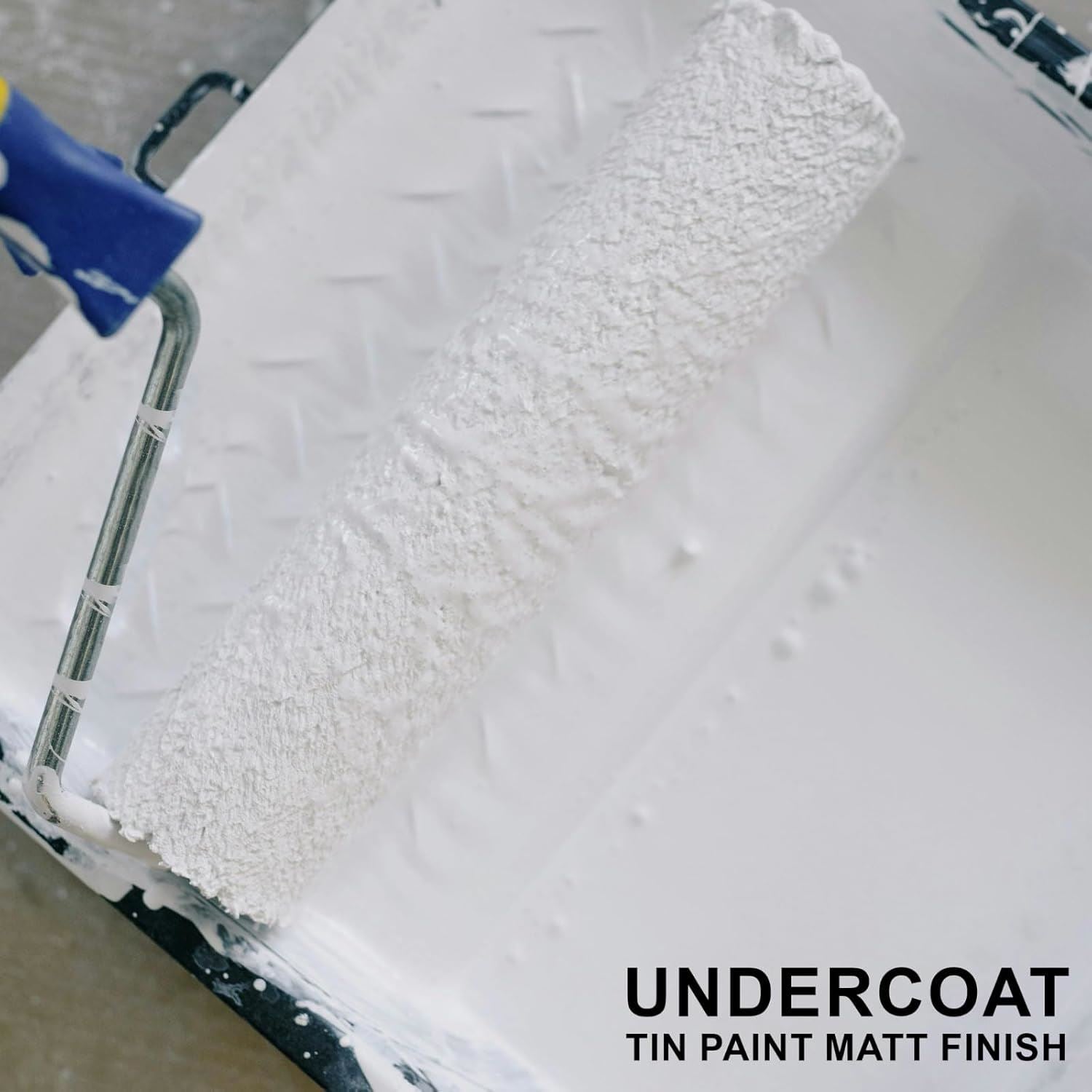 White matt undercoat paint 300ml in a tin with a roller in a tray for smooth application