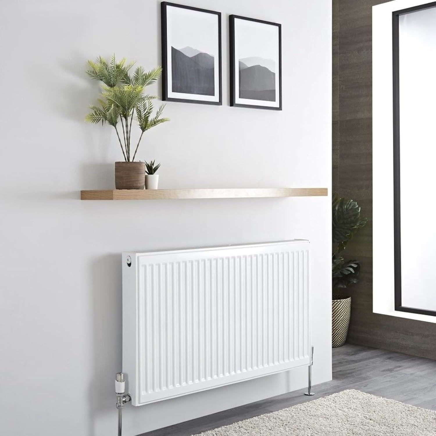 Radiator enamel white paint applied on a sleek, modern white radiator in a stylish living room