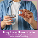 Red Label Health Magnesium Citrate 740mg capsules in hand with a glass of water for easy swallowing
